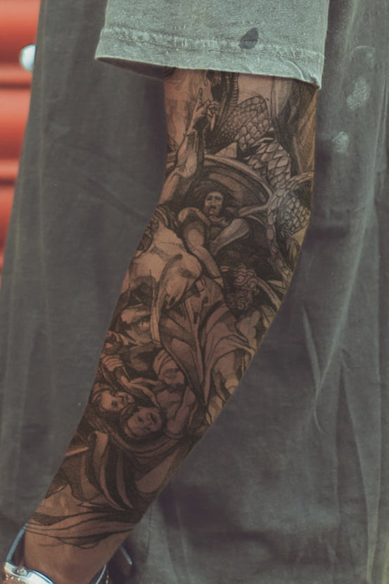 Tattoo sleeve design on a white background and a person wearing a tattoo on their arm.